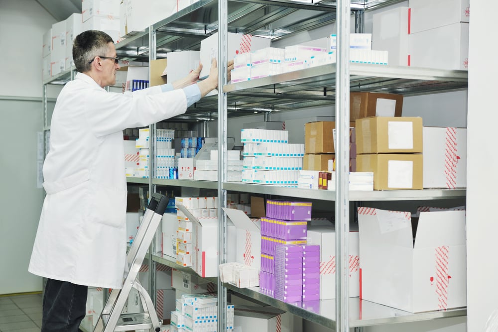 medical factory supplies storage indoor with workers people