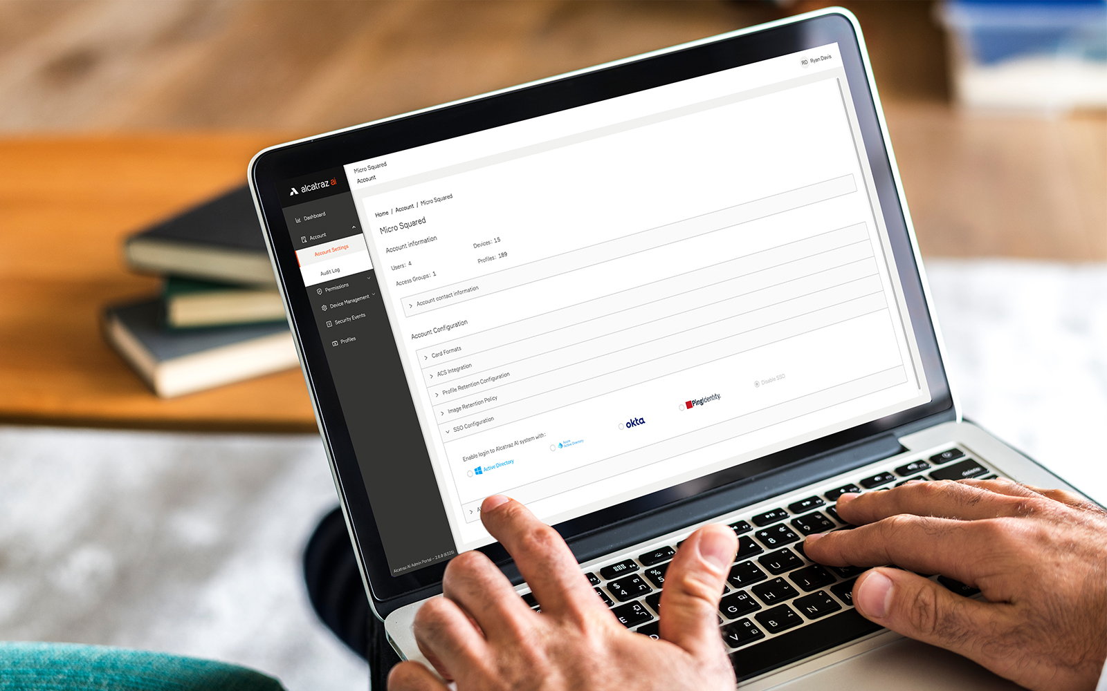 Image of person using a laptop using the Alcatraz AI Admin Portal