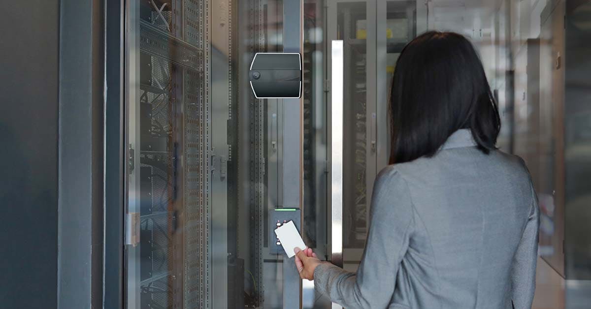 A woman using two-factor authentication to enter a secure space