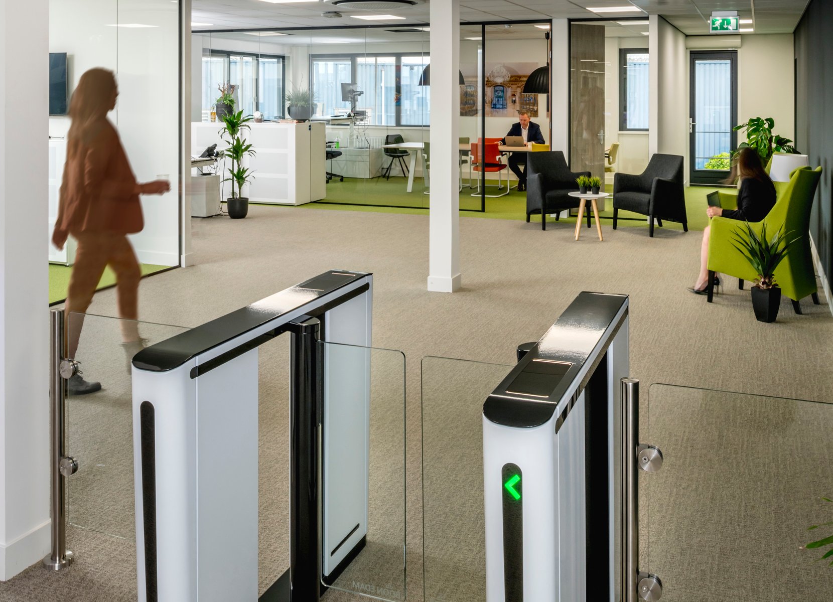 Turnstiles in an office environment.